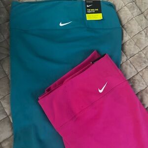 Two pairs of Nike one Women's tight fit shorts (TWO PAIRS)